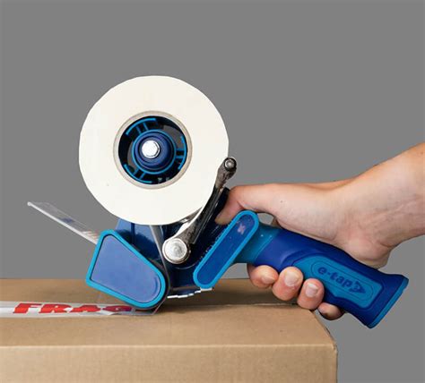 Insert the roll of <strong>packing tape</strong> onto the large <strong>dispenser</strong> wheel on the top-right of the <strong>tape dispenser</strong> with its handle grip to the right. . Scotch packing tape dispenser how to load diagram